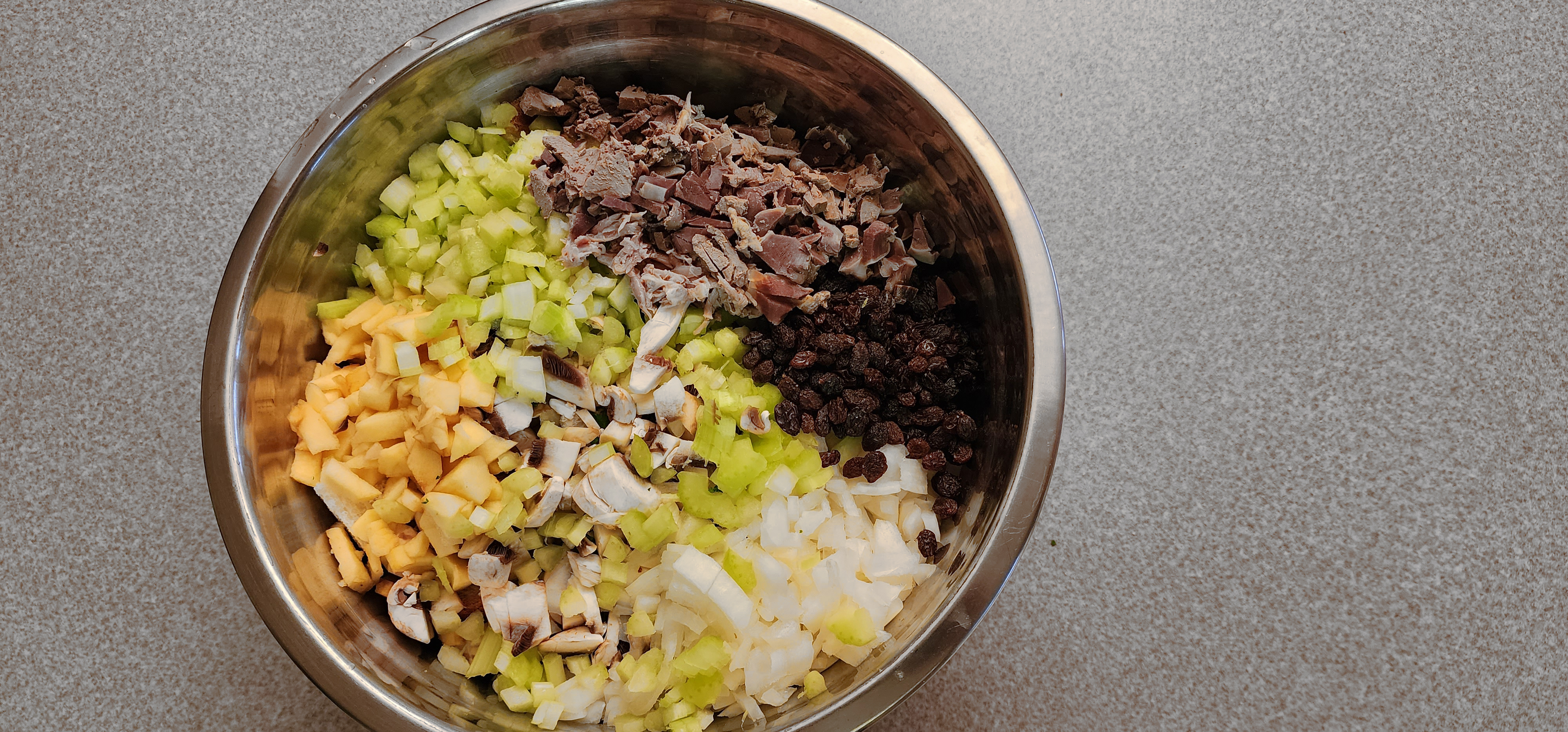 ingredients in the mixing bowl before adding eggs and mixing