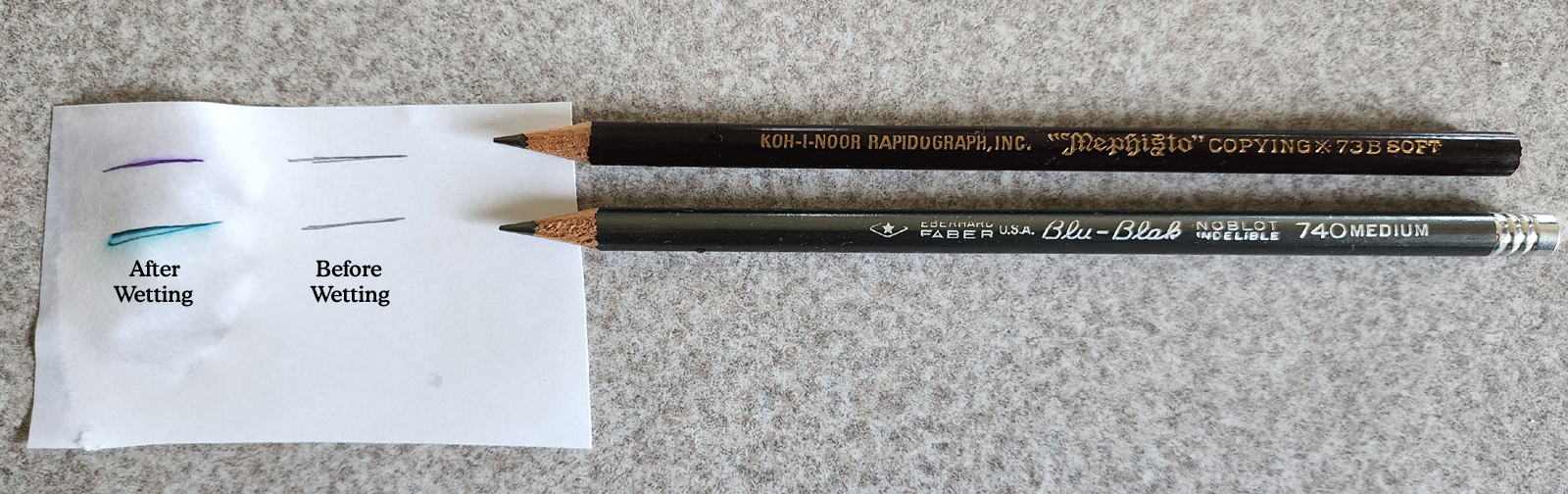 examples of indelible pencils that change from gray to another color when wet