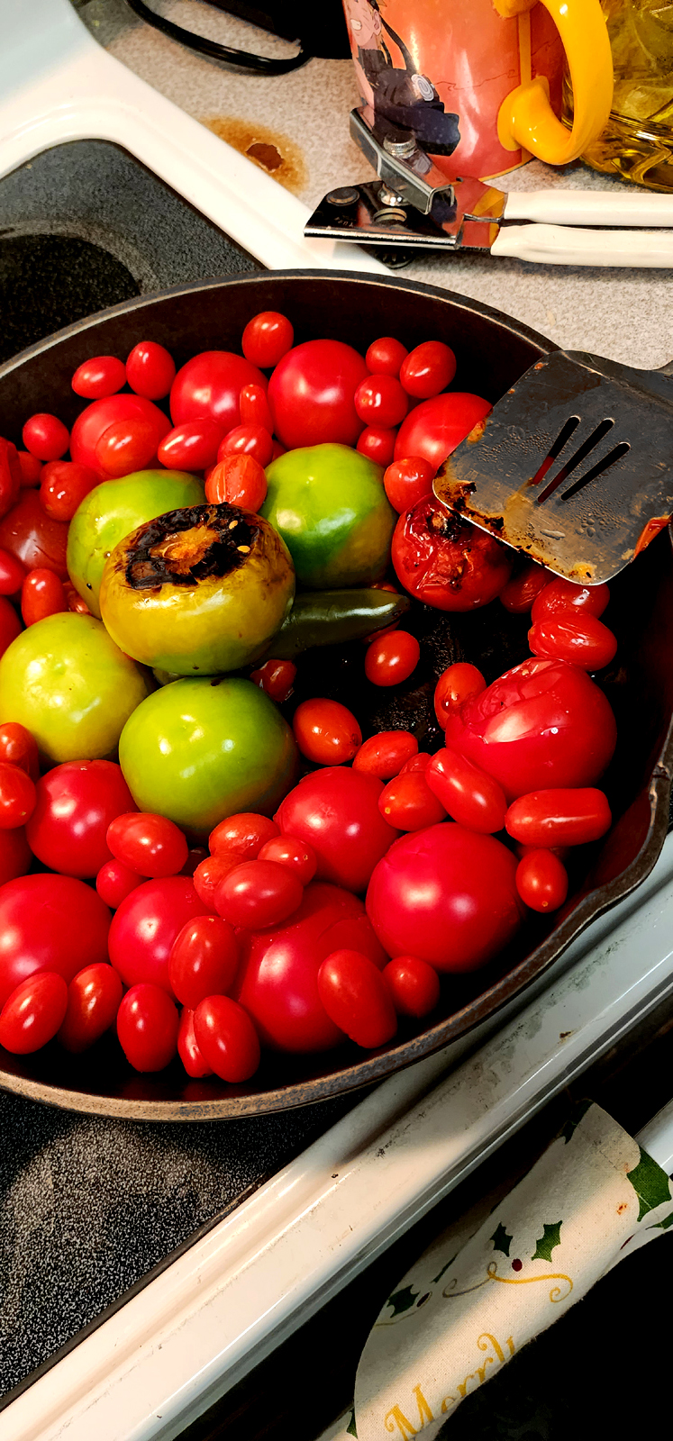 Cast iron pan with burned vegetables