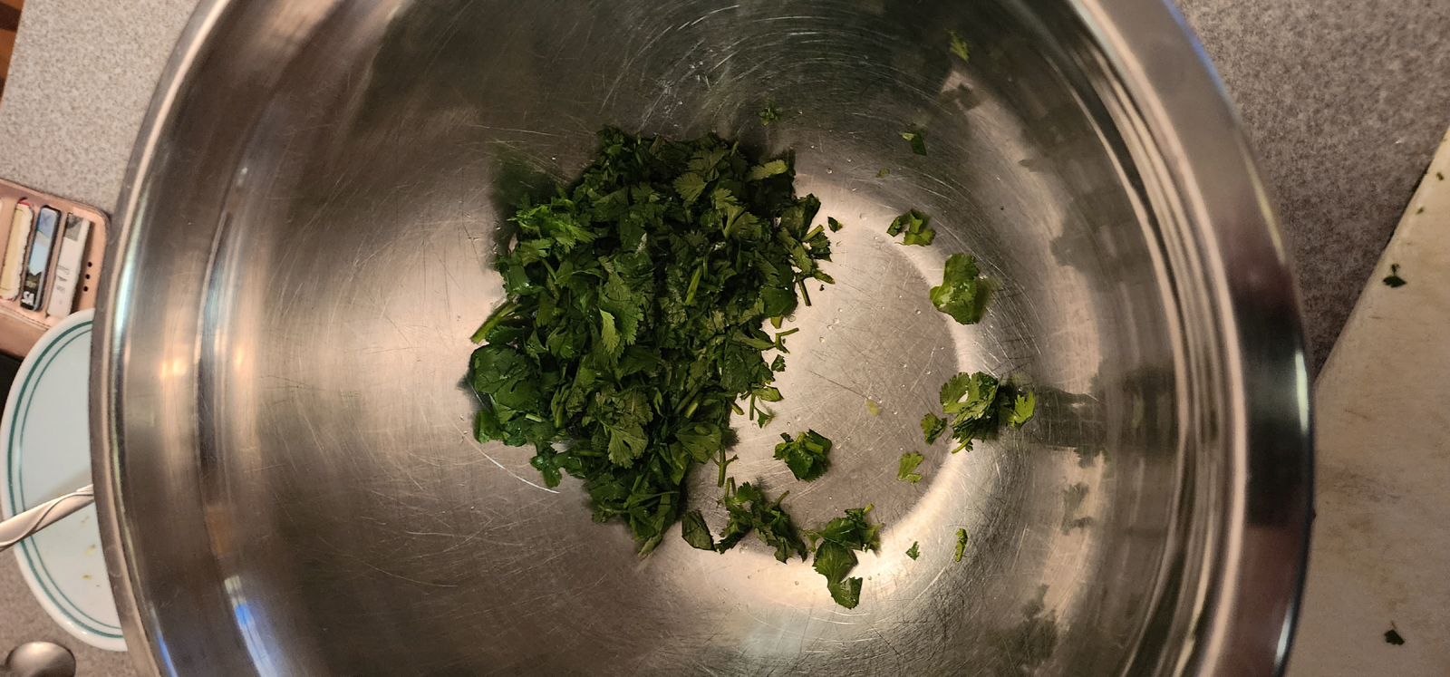 Cilantro in a mixing bowl